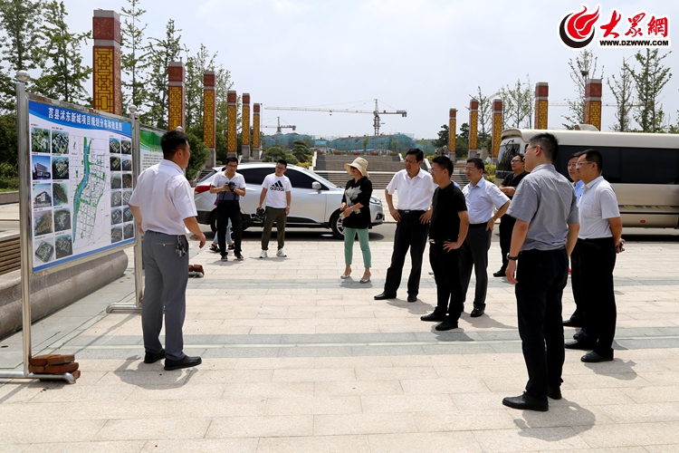 莒县人民政府党组副书记田洪生,莒县贸易办主任唐修